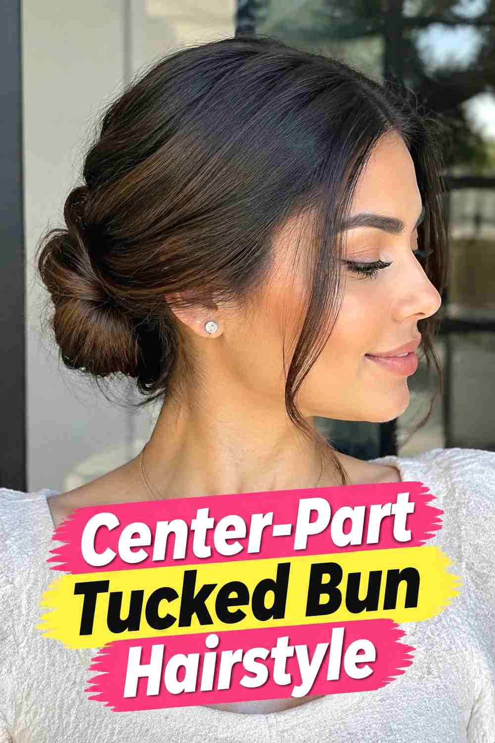 5. Center Part Tucked Bun Hairstyle