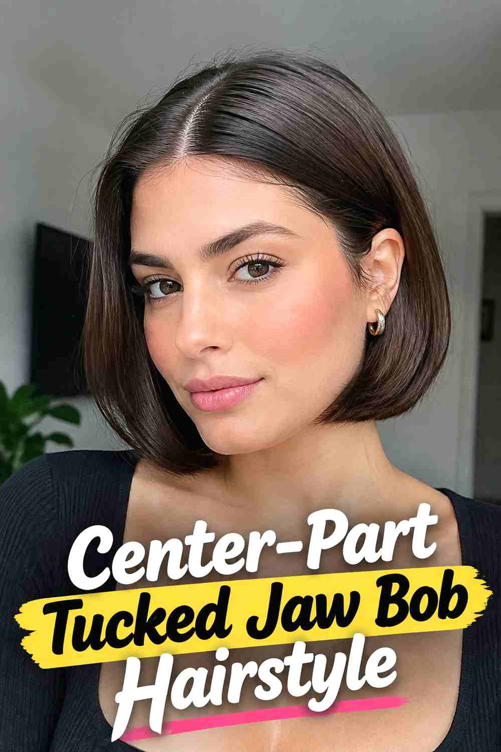 2. Center Part Tucked Jaw Bob Hairstyle