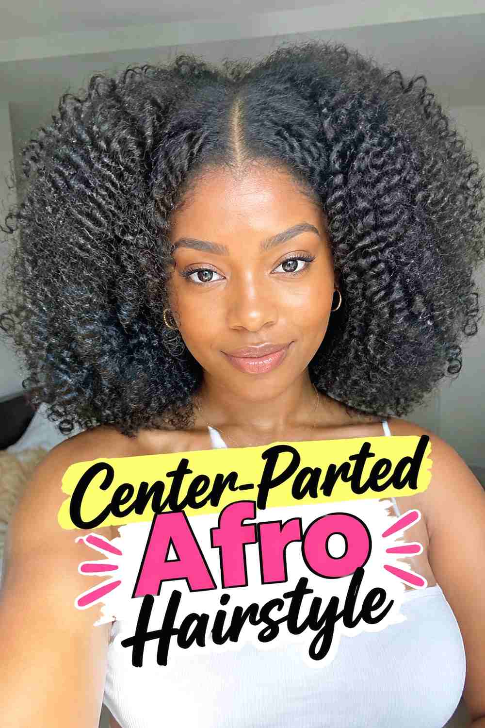 15. Center Parted Afro Hairstyle