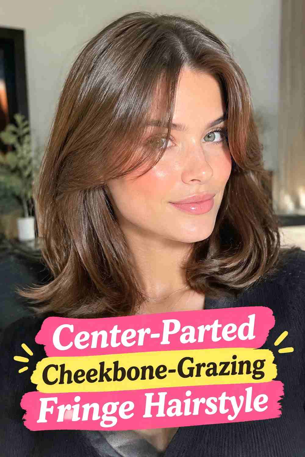 3. Center Parted Cheekbone Grazing Fringe Hairstyle