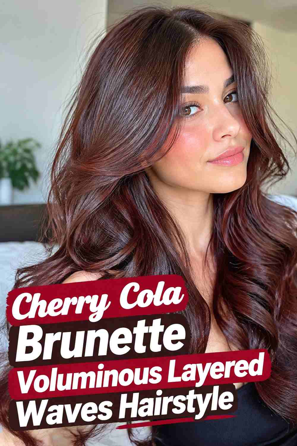 12. Cherry Cola Brunette Voluminous Layered Waves Hairstyle