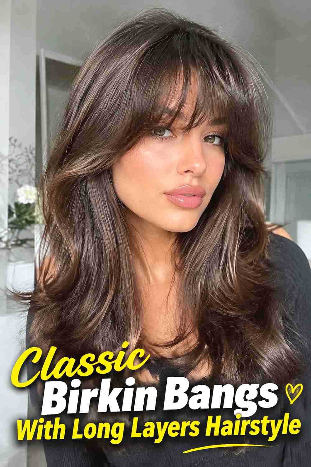 1. Classic Birkin Bangs With Long Layers Hairstyle