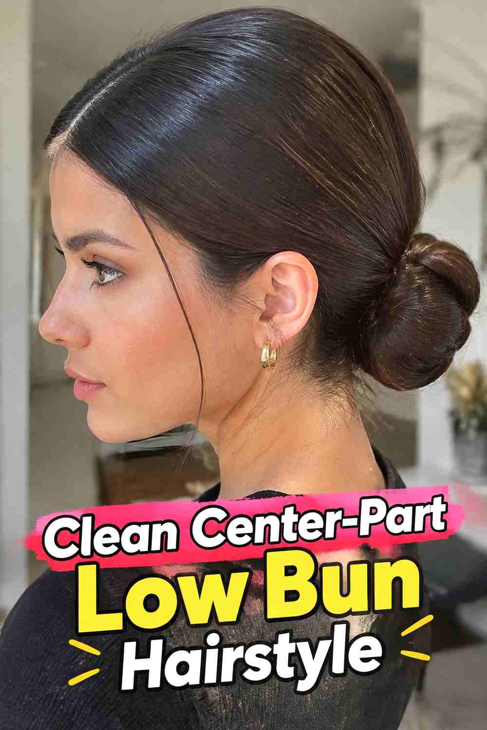 1. Clean Center Part Low Bun Hairstyle