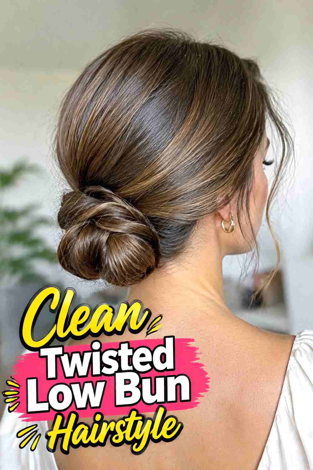 4. Clean Twisted Low Bun Hairstyle