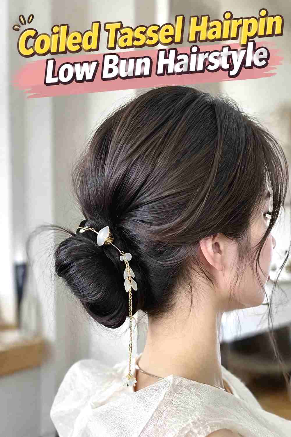 11. Coiled Tassel Hairpin Low Bun Hairstyle