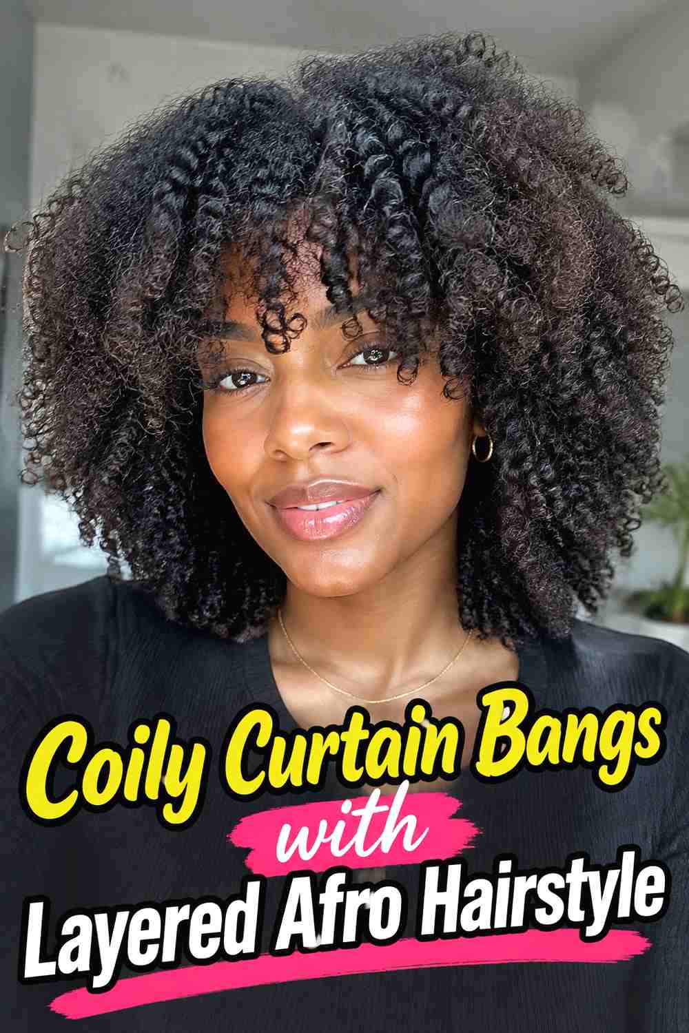5. Coily Curtain Bangs With Layered Afro Hairstyle