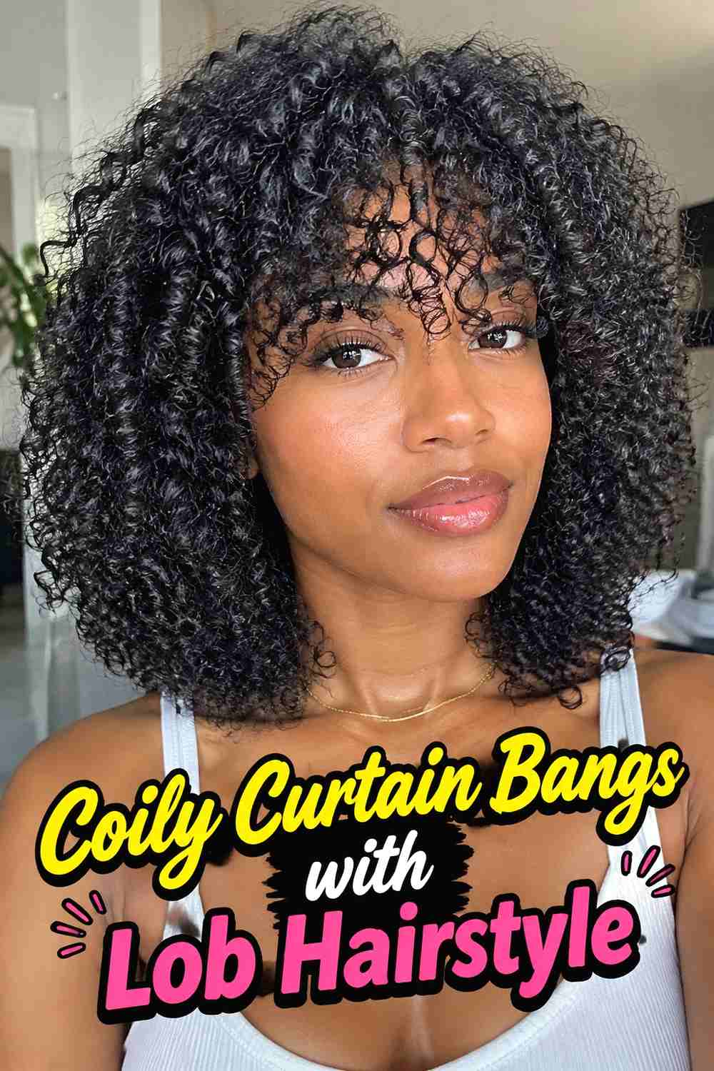 13. Coily Curtain Bangs With Lob Hairstyle