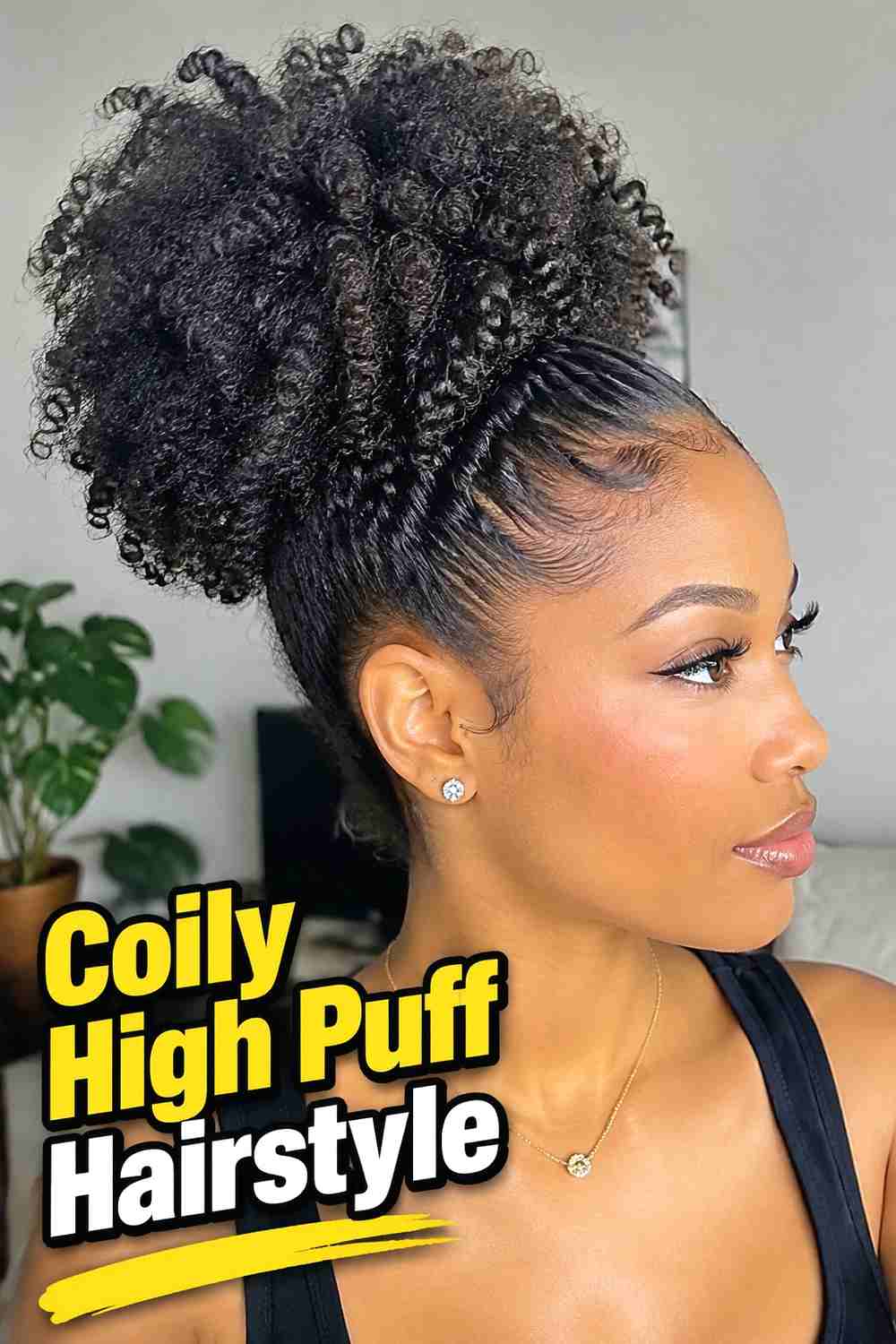 14. Coily High Puff Hairstyle