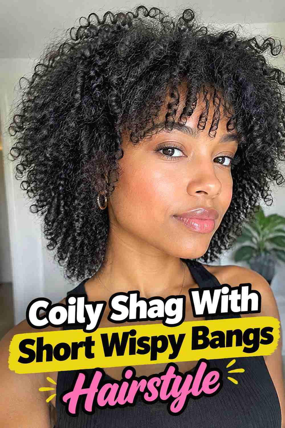 13. Coily Shag With Short Wispy Bangs Hairstyle