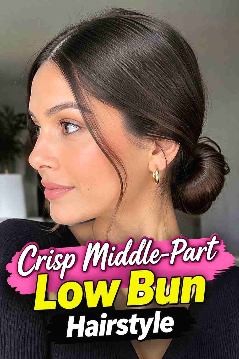 3. Crisp Middle Part Low Bun Hairstyle