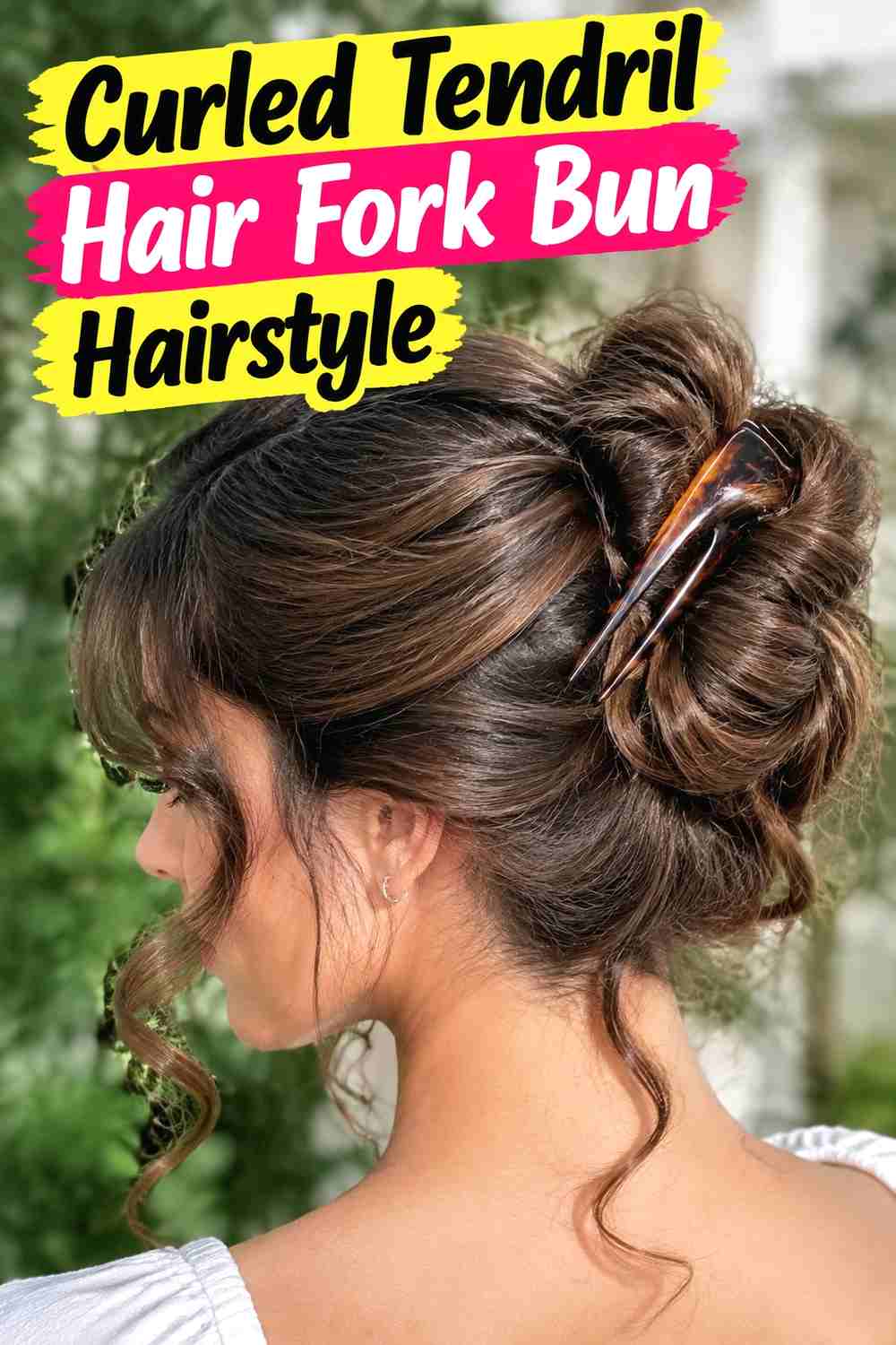 13. Curled Tendril Hair Fork Bun Hairstyle