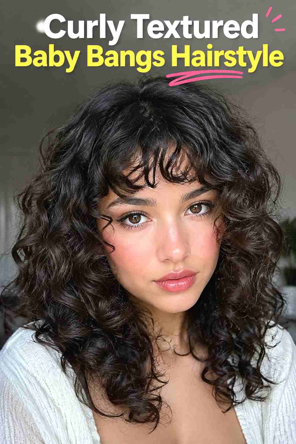 9. Curly Textured Baby Bangs Hairstyle