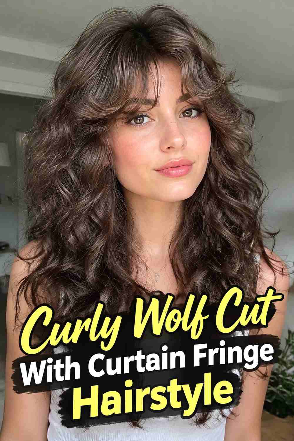 7. Curly Wolf Cut With Curtain Fringe Hairstyle