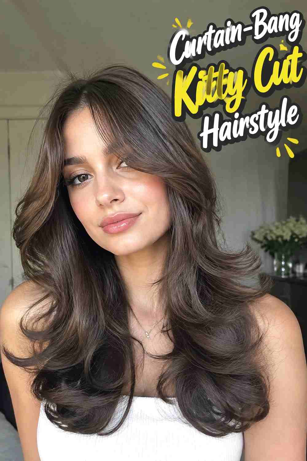 4. Curtain Bang Kitty Cut Hairstyle