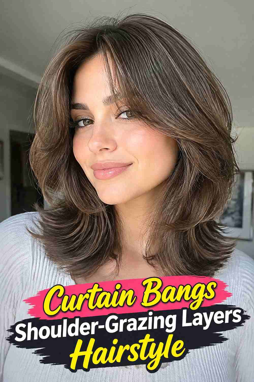 5. Curtain Bangs Shoulder Grazing Layers Hairstyle