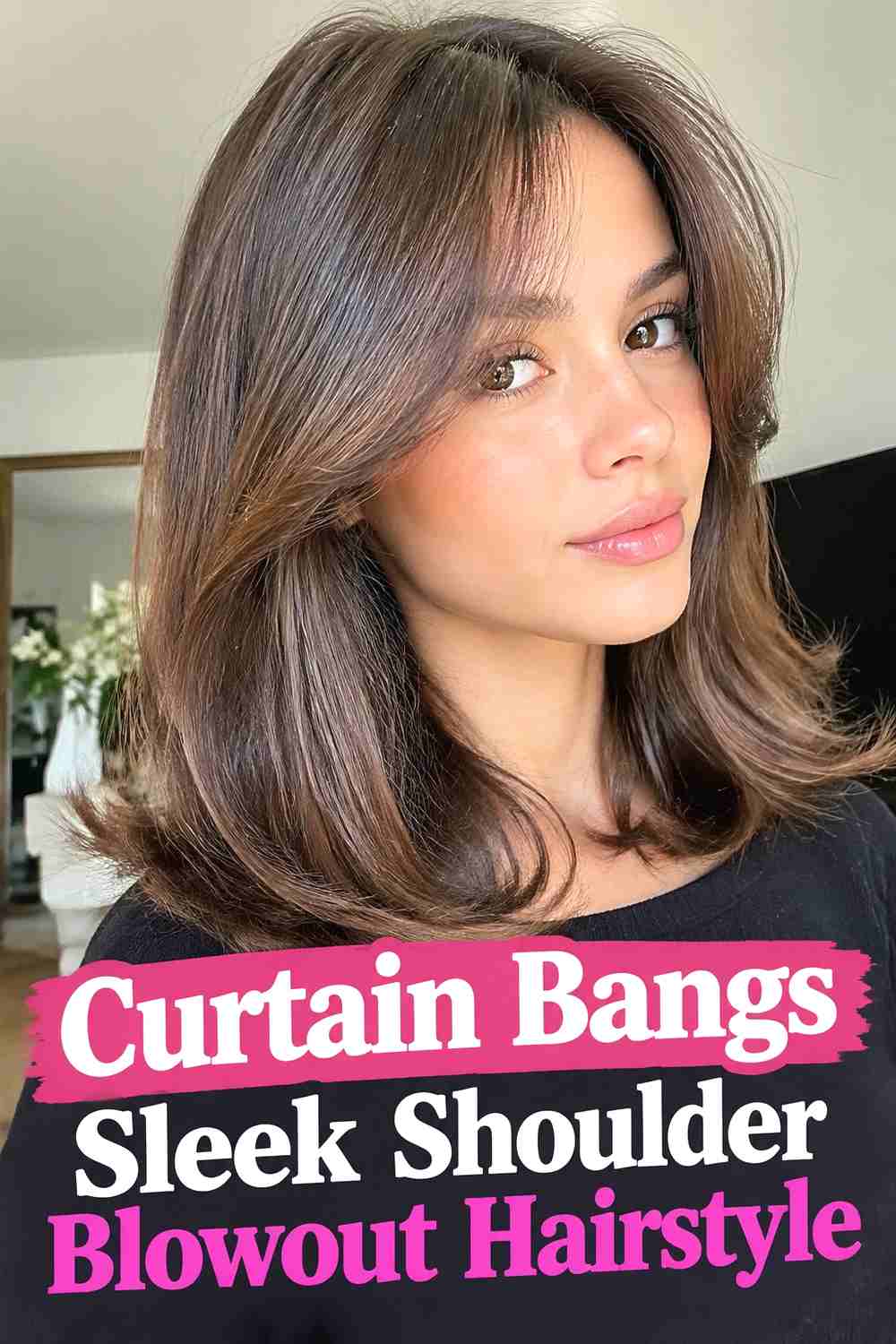 4. Curtain Bangs Sleek Shoulder Blowout Hairstyle