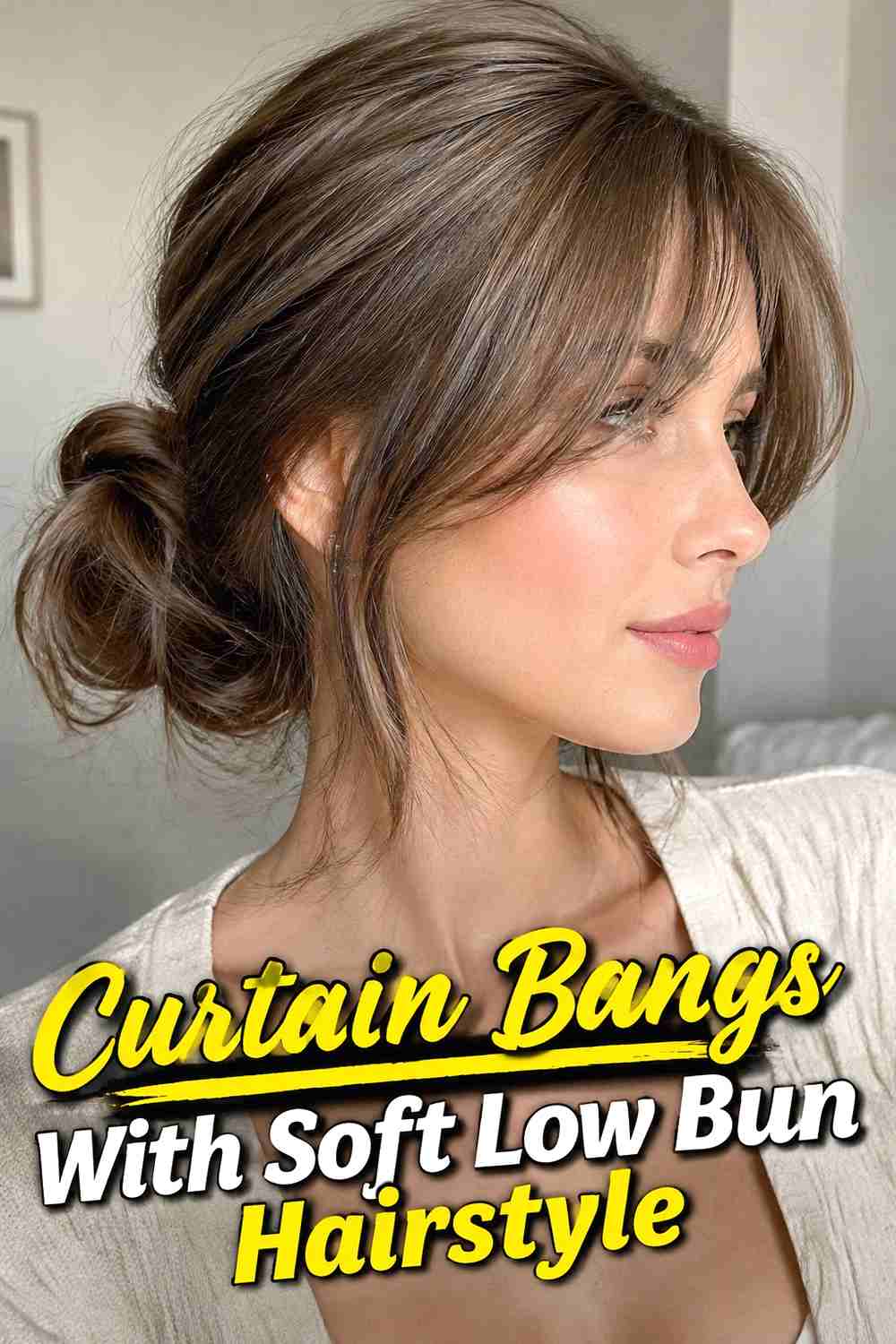7. Curtain Bangs With Soft Low Bun Hairstyle