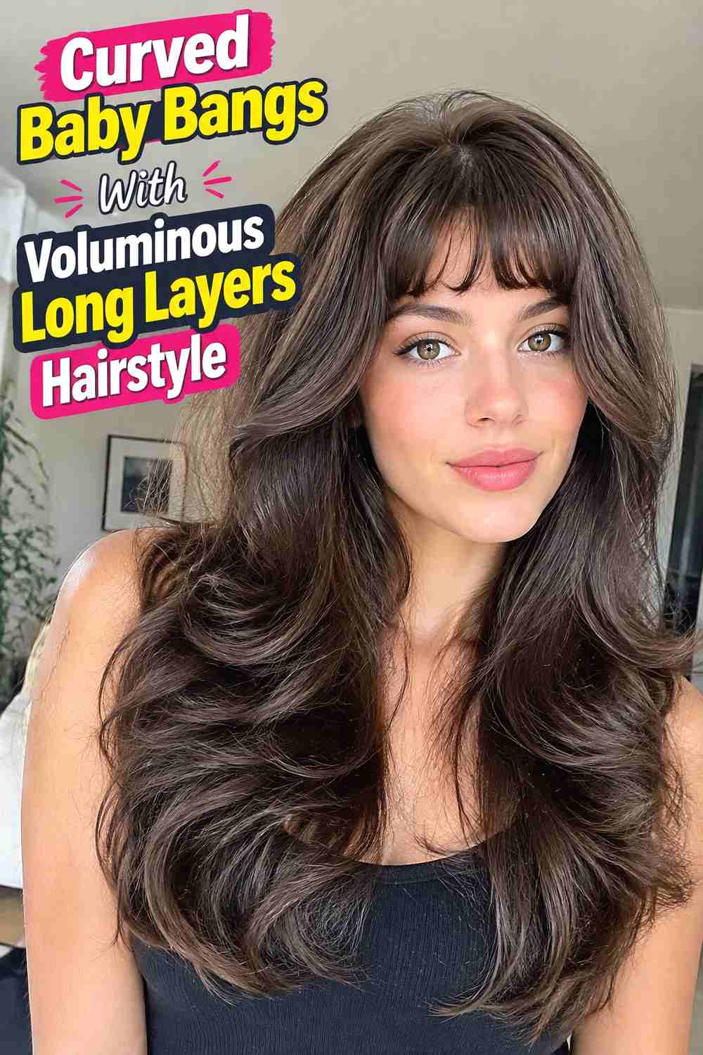4. Curved Baby Bangs With Voluminous Long Layers Hairstyle