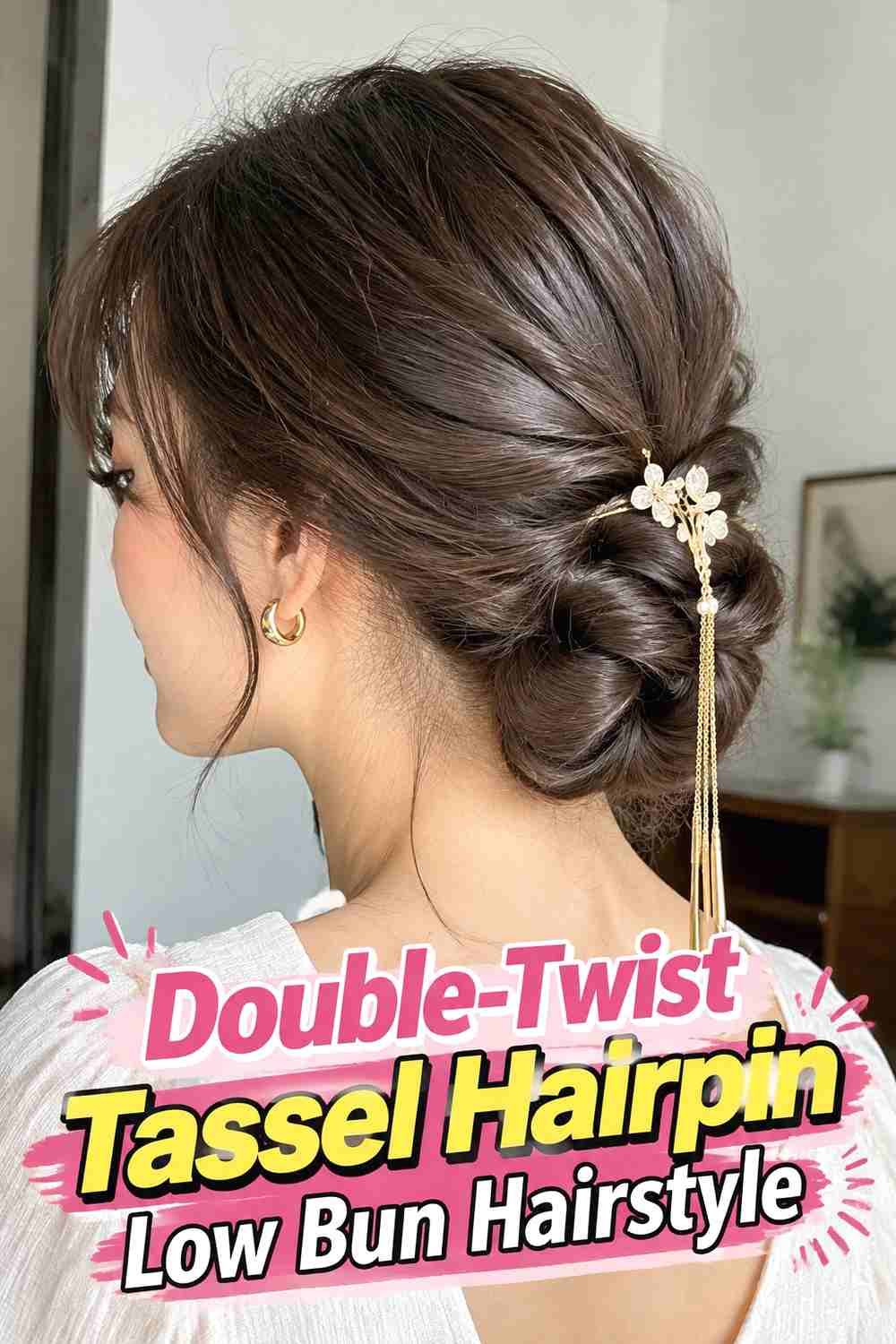 9. Double Twist Tassel Hairpin Low Bun Hairstyle