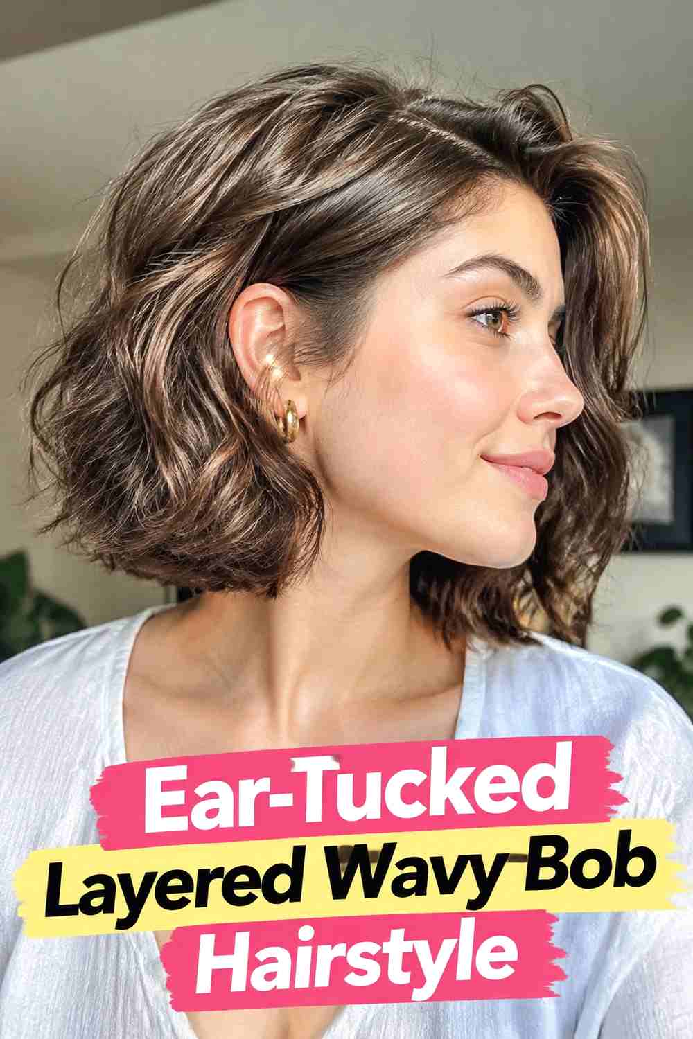 14. Ear Tucked Layered Wavy Bob Hairstyle
