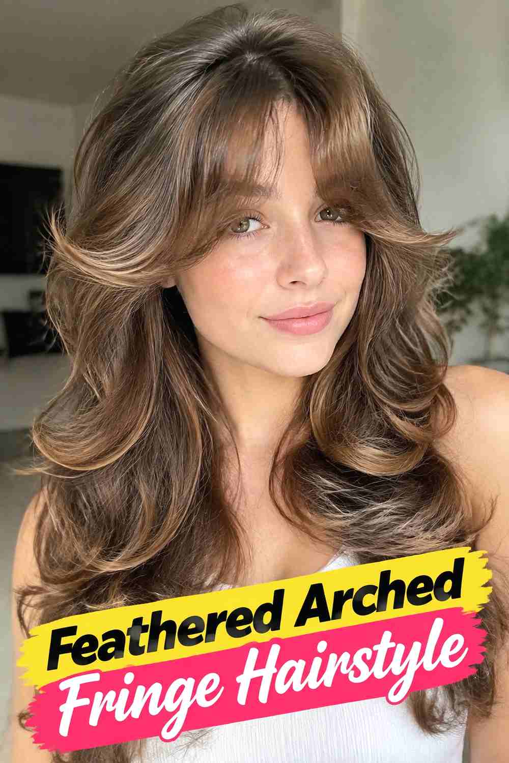 6. Feathered Arched Fringe Hairstyle