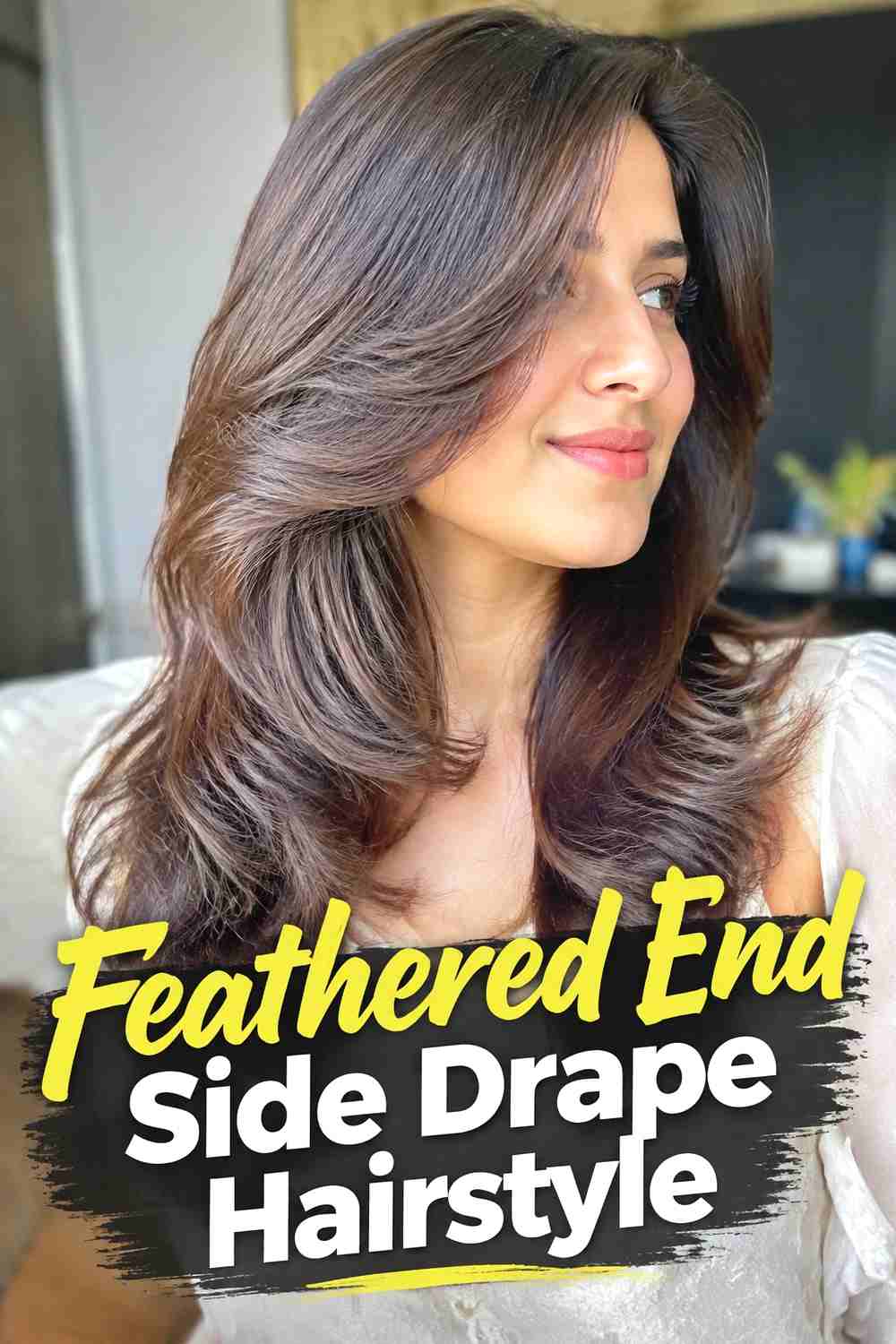 13. Feathered End Side Drape Hairstyle