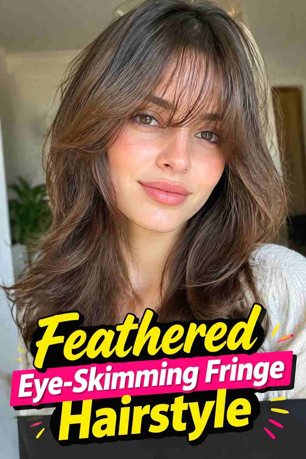 4. Feathered Eye Skimming Fringe Hairstyle