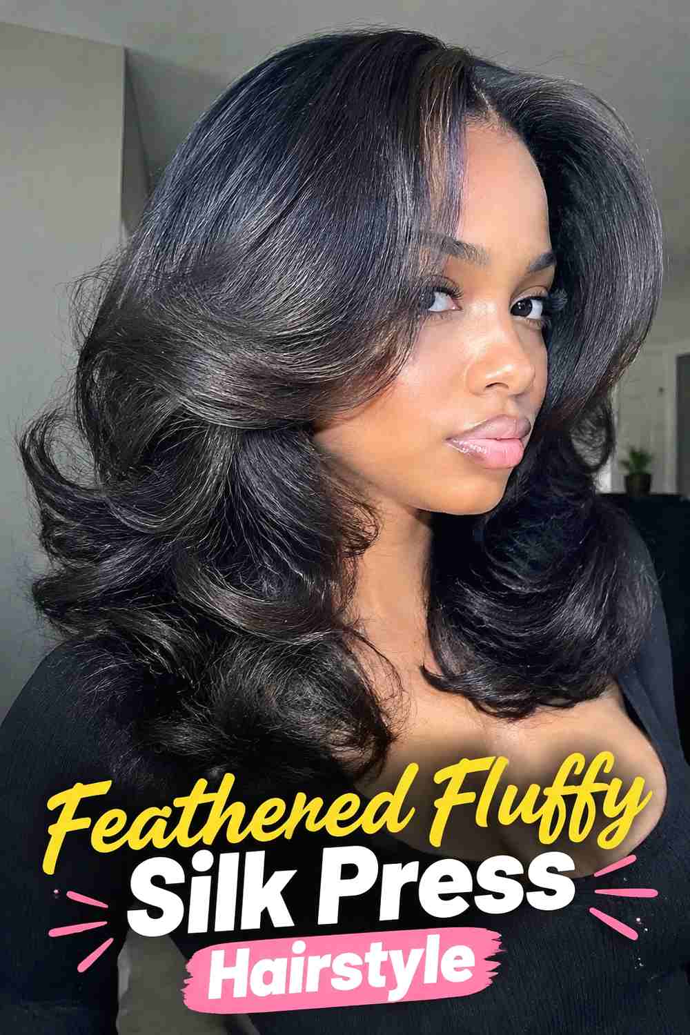 10. Feathered Fluffy Silk Press Hairstyle