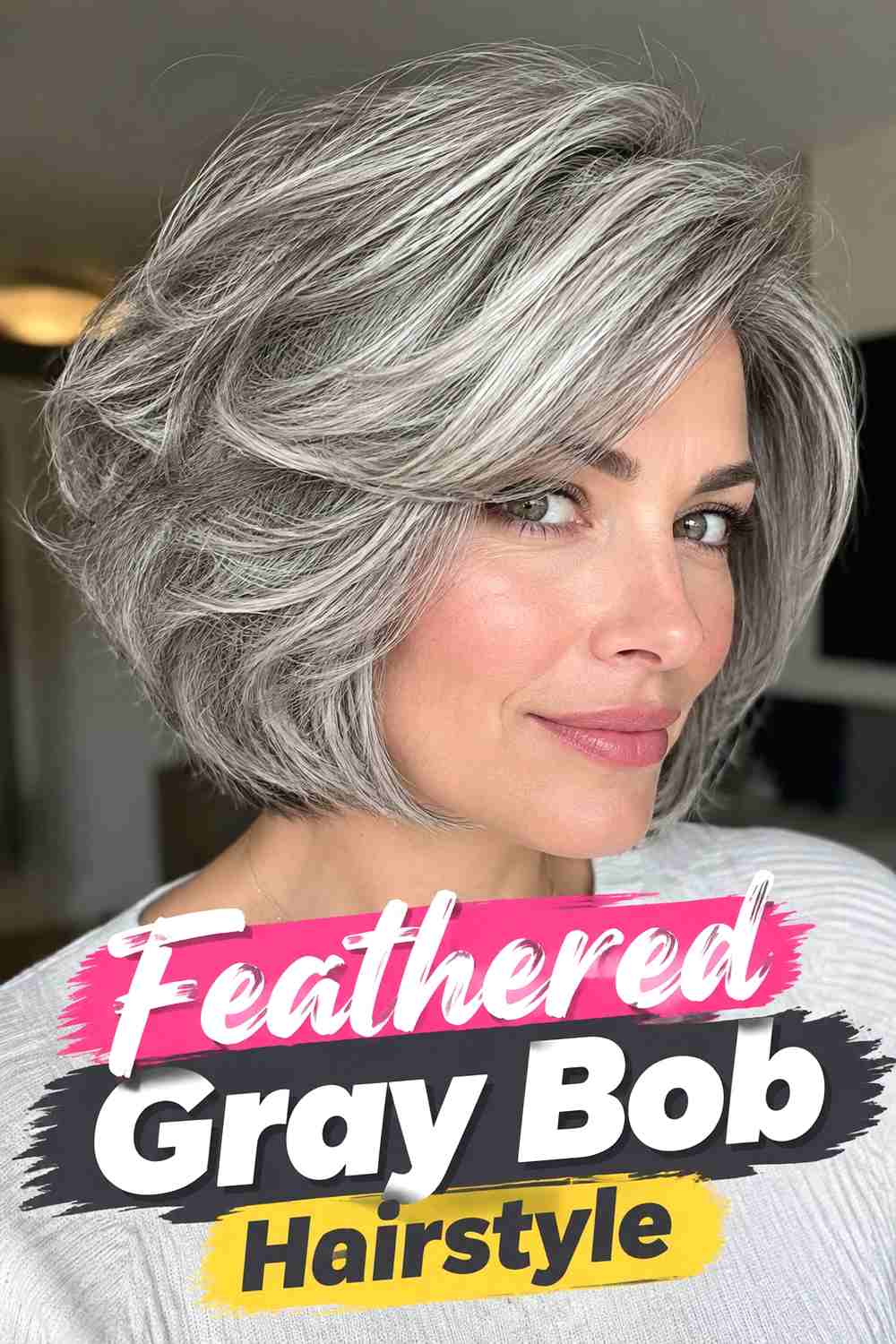 2. Feathered Gray Bob Hairstyle