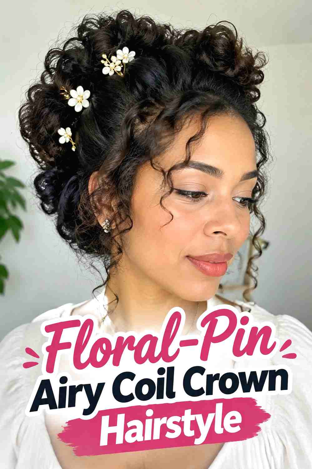 10. Floral Pin Airy Coil Crown Hairstyle