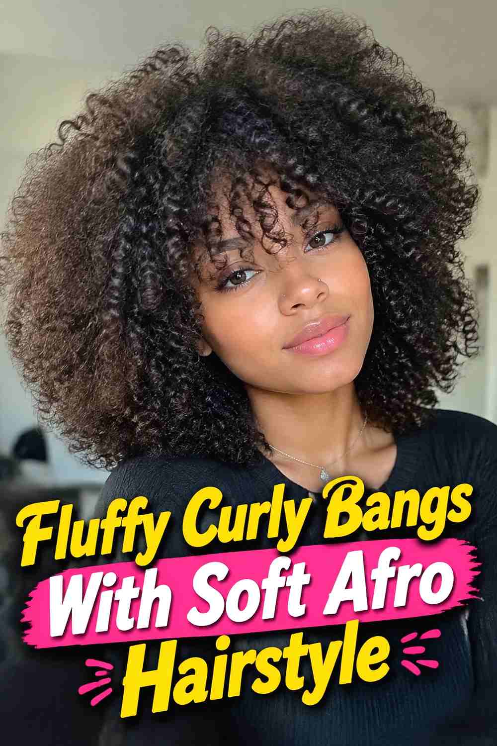 10. Fluffy Curly Bangs With Soft Afro Hairstyle