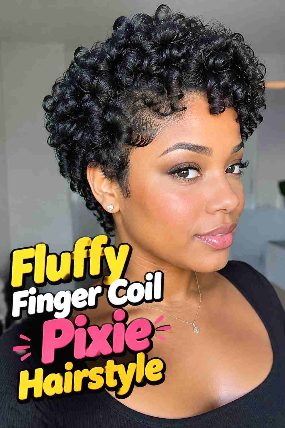 12. Fluffy Finger Coil Pixie Hairstyle