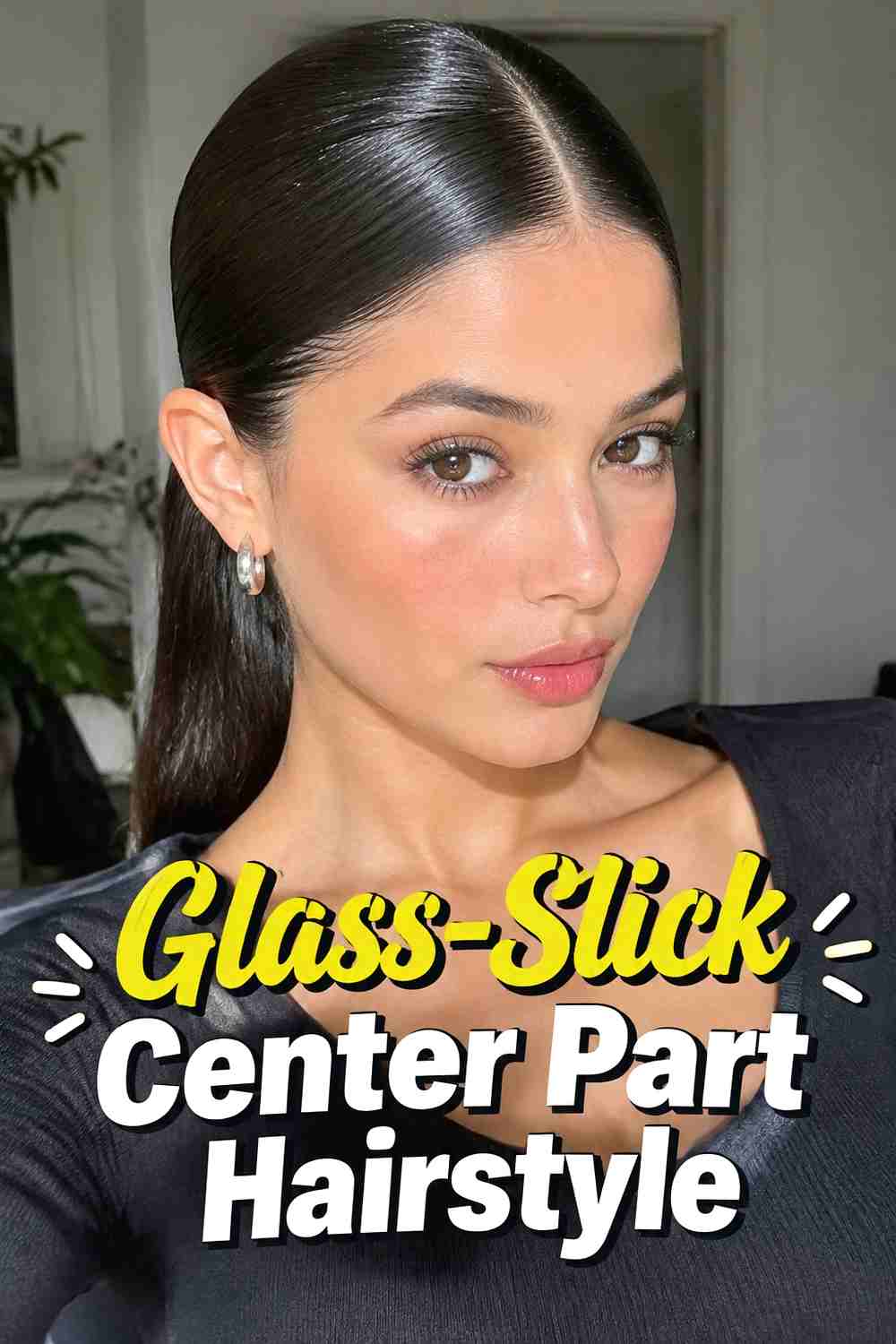 1. Glass Slick Center Part Hairstyle