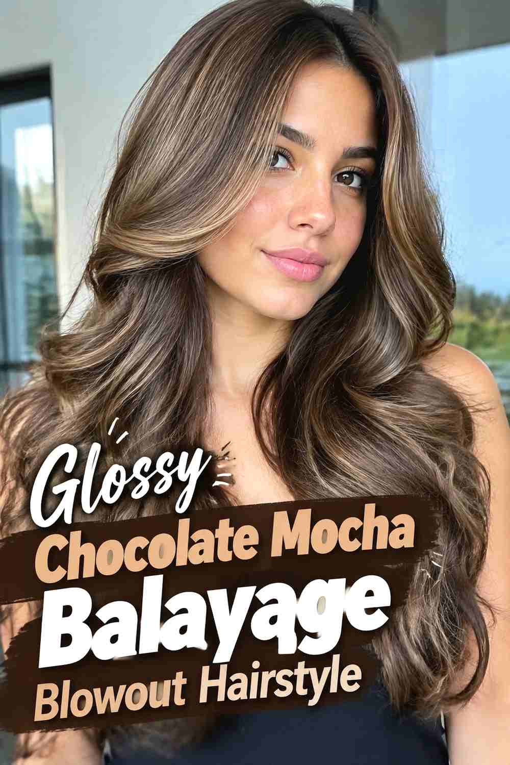 15. Glossy Chocolate Mocha Balayage Blowout Hairstyle