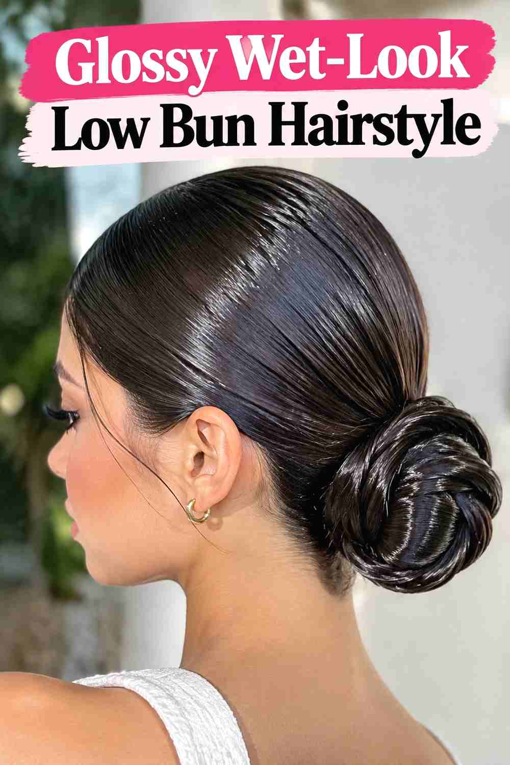 8. Glossy Wet Look Low Bun Hairstyle