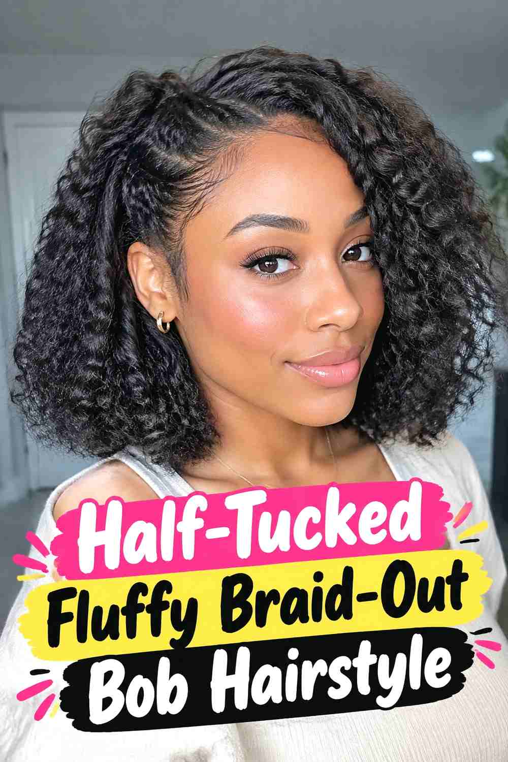 18. Half Tucked Fluffy Braid Out Bob Hairstyle