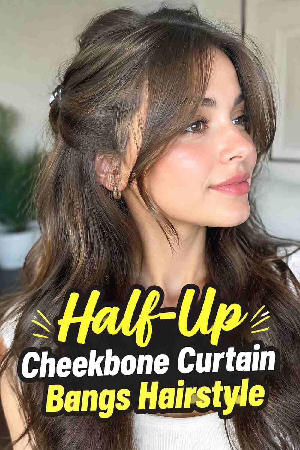 12. Half Up Cheekbone Curtain Bangs Hairstyle