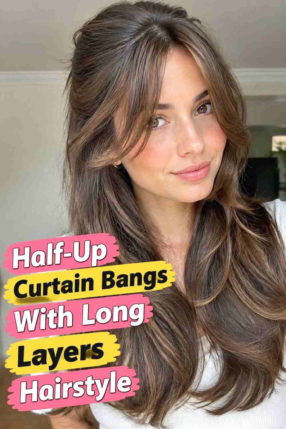 13. Half Up Curtain Bangs With Long Layers Hairstyle