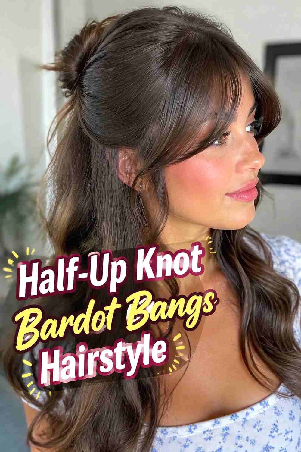 10. Half Up Knot Bardot Bangs Hairstyle