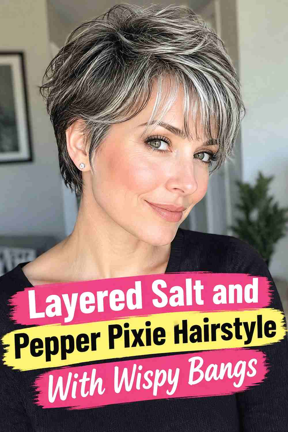 5. Layered Salt And Pepper Pixie Hairstyle With Wispy Bangs