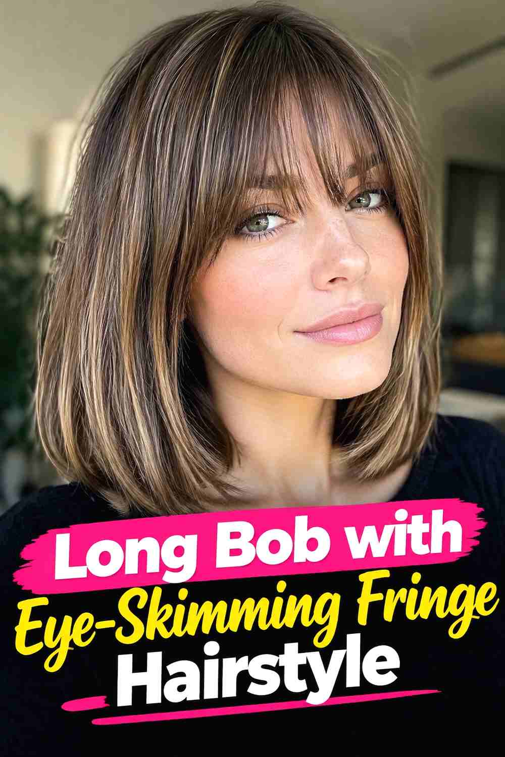 11. Long Bob With Eye Skimming Fringe Hairstyle