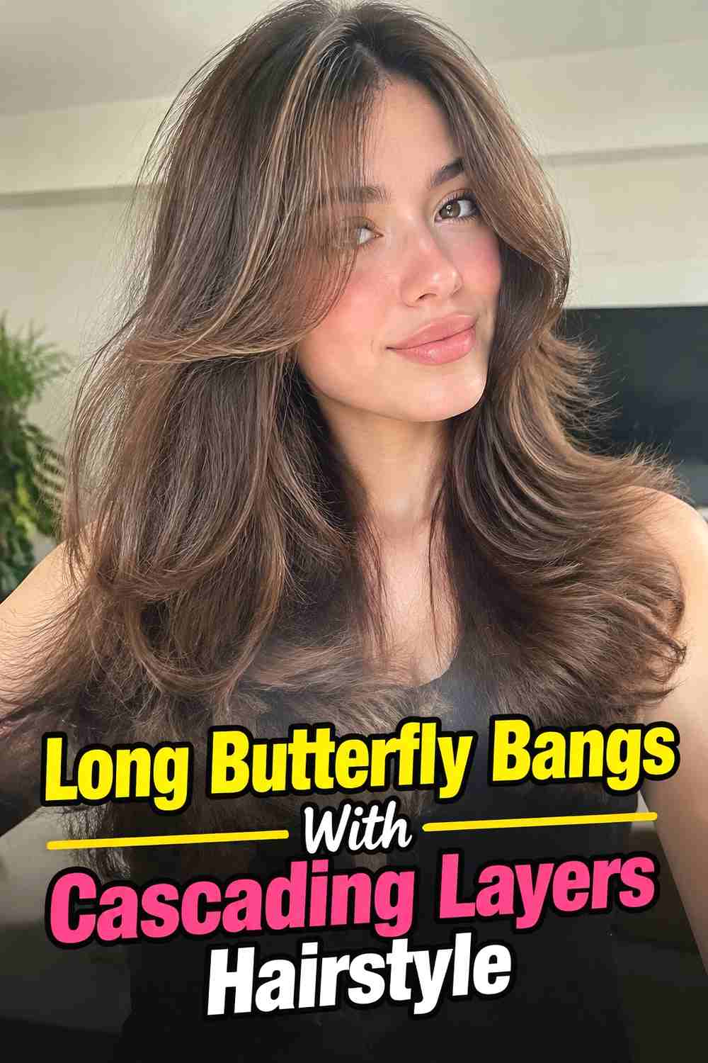 10. Long Butterfly Bangs With Cascading Layers Hairstyle