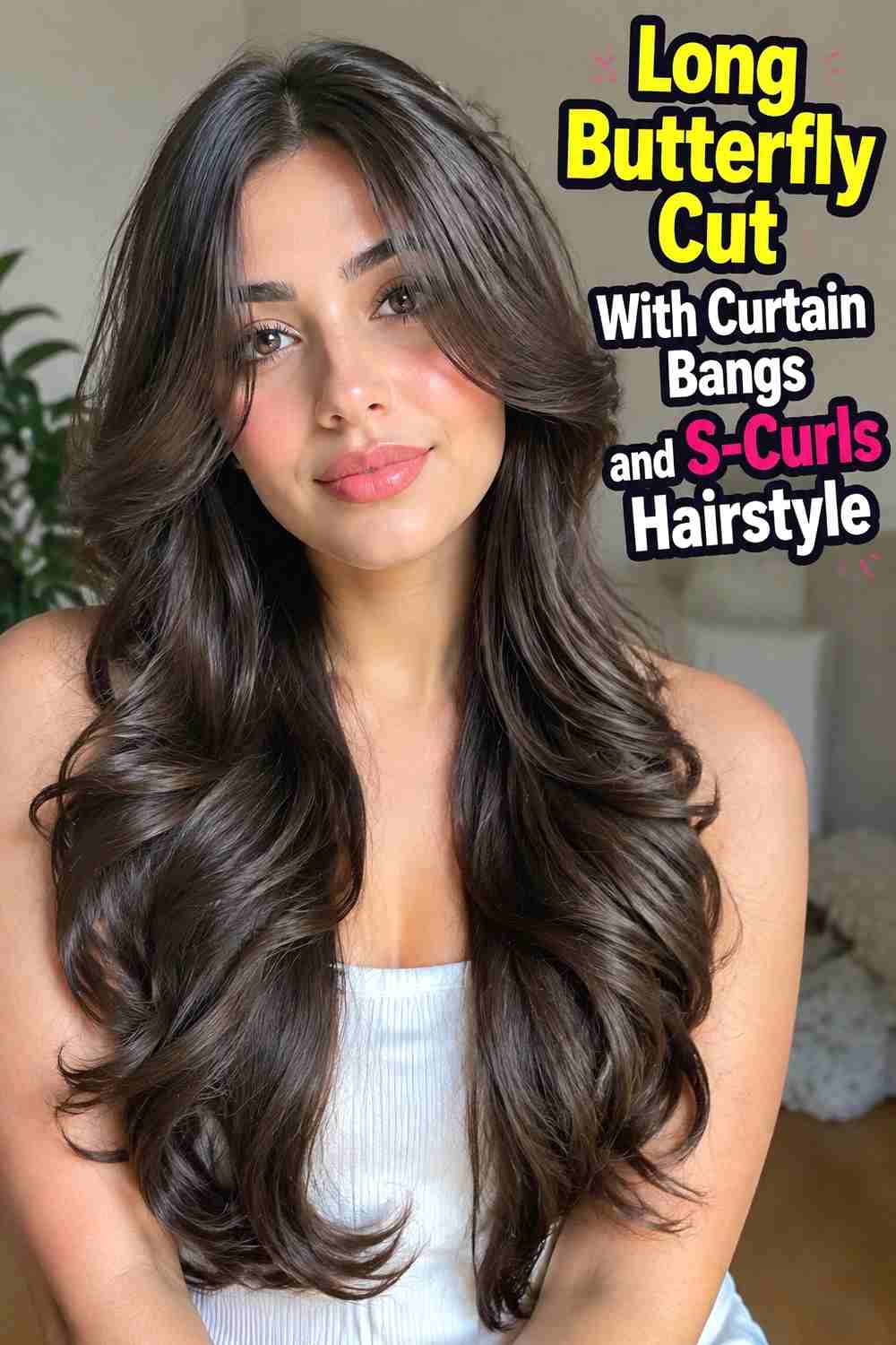 5. Long Butterfly Cut With Curtain Bangs And S Curls Hairstyle