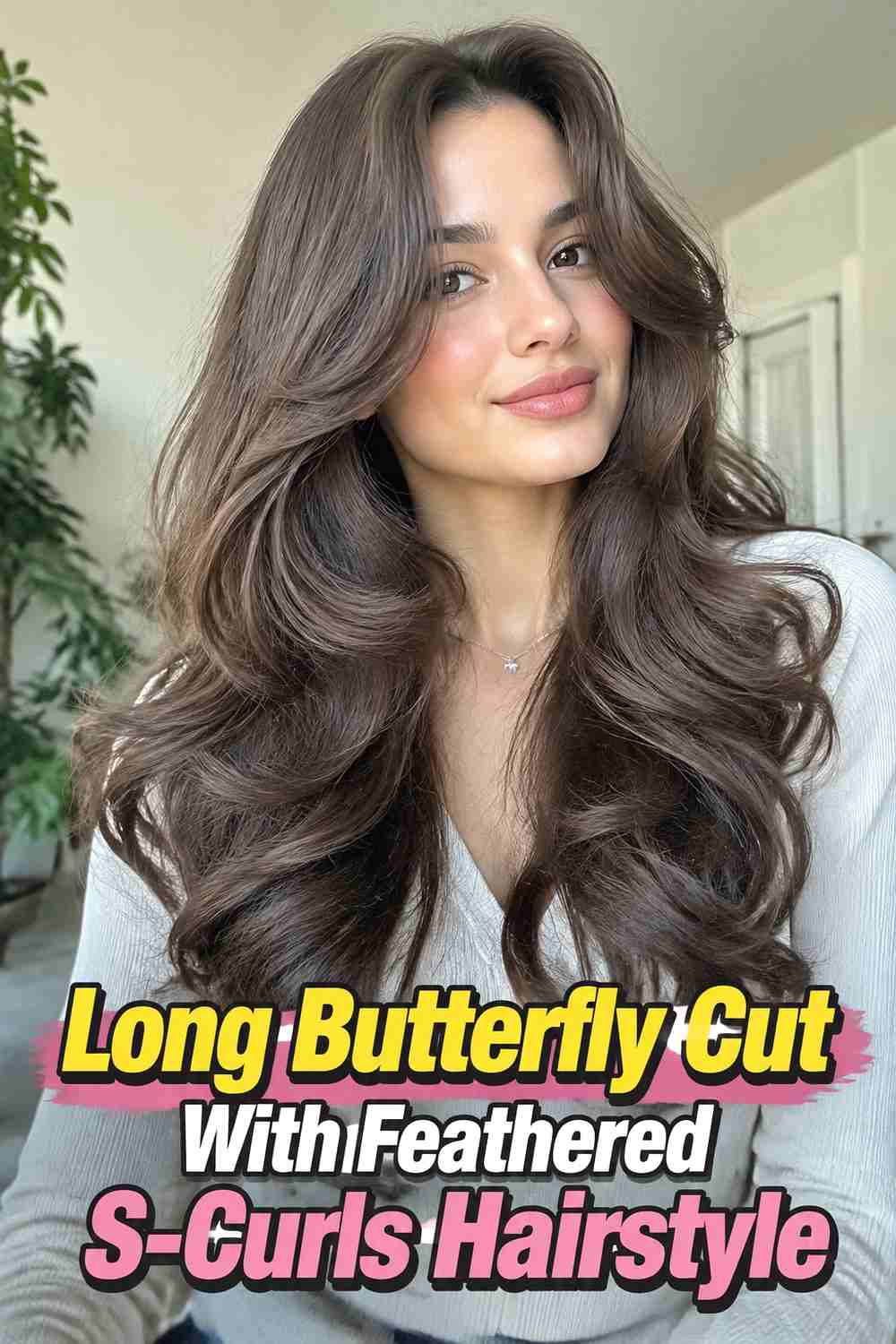 12. Long Butterfly Cut With Feathered S Curls Hairstyle