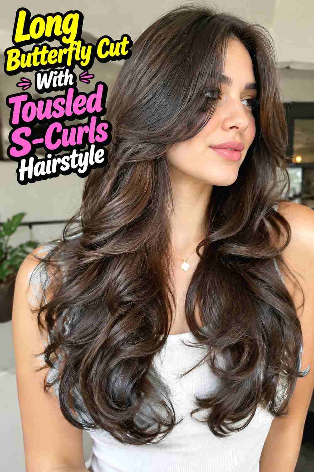 13. Long Butterfly Cut With Tousled S Curls Hairstyle