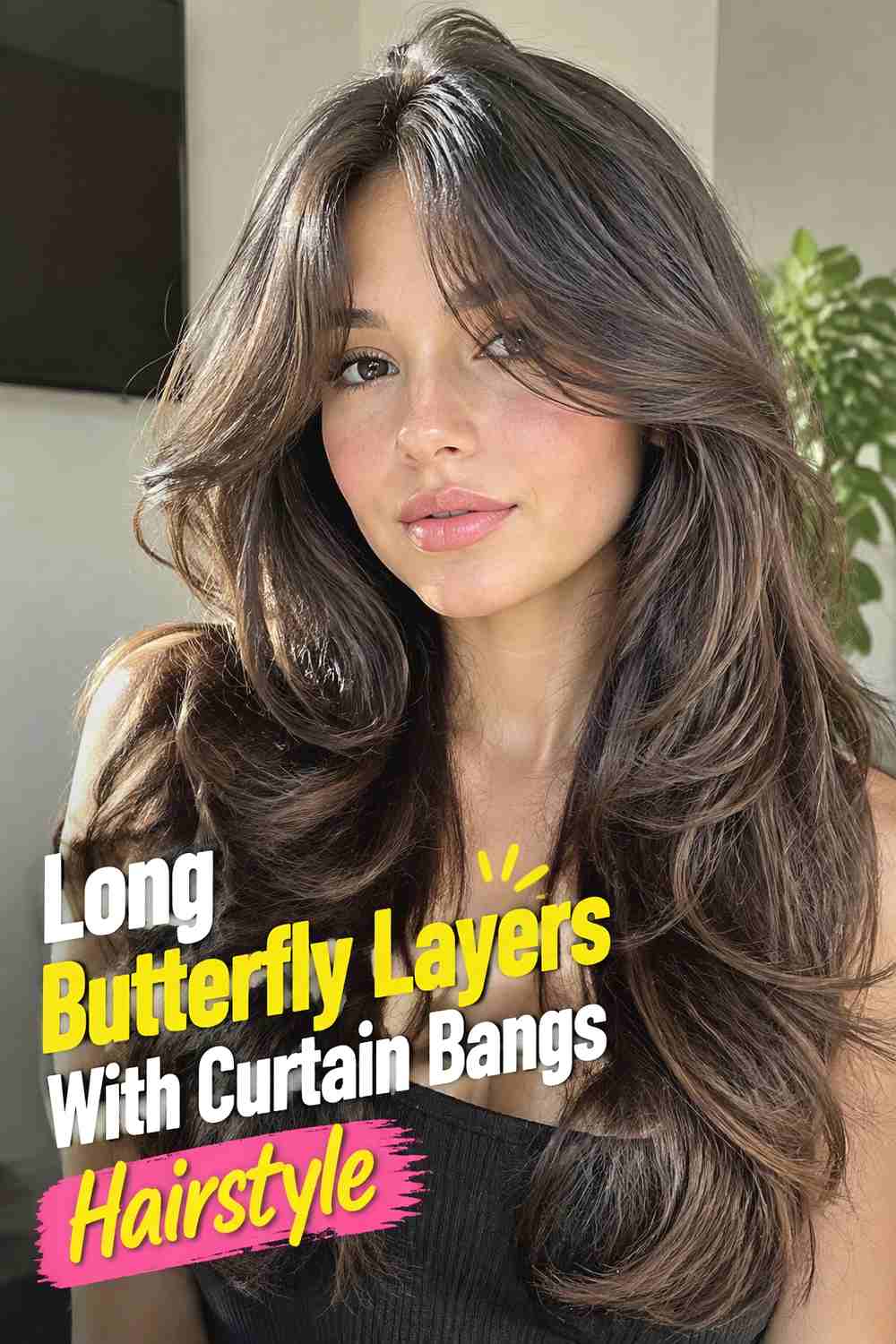 2. Long Butterfly Layers With Curtain Bangs Hairstyle