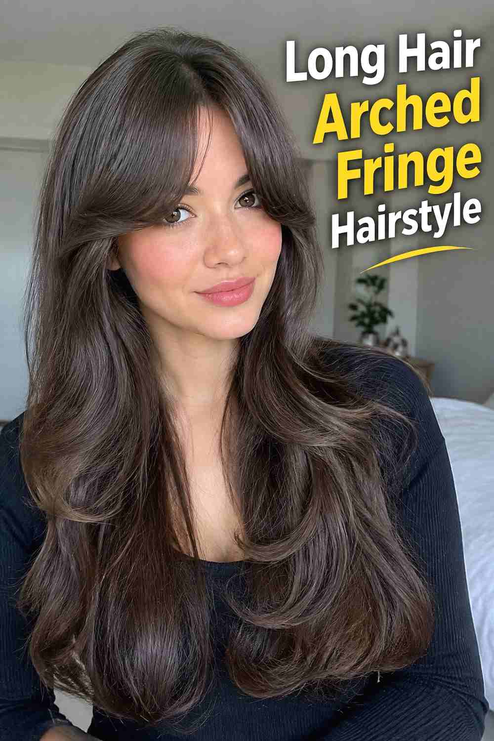 15. Long Hair Arched Fringe Hairstyle