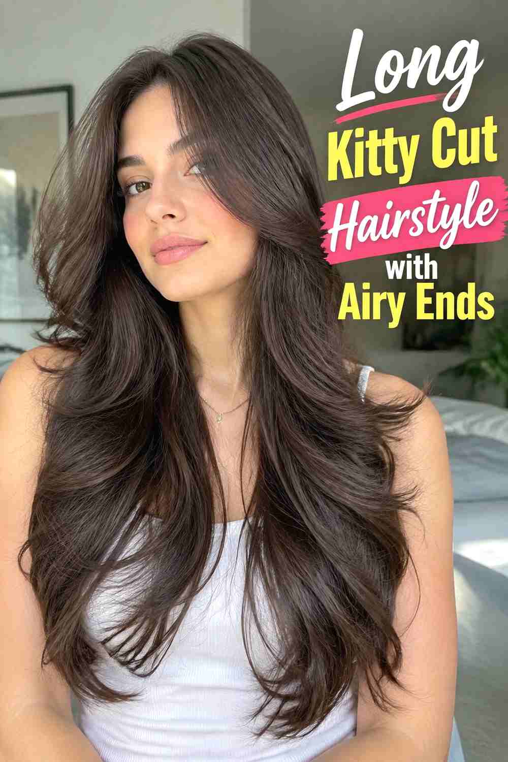 14. Long Kitty Cut Hairstyle With Airy Ends