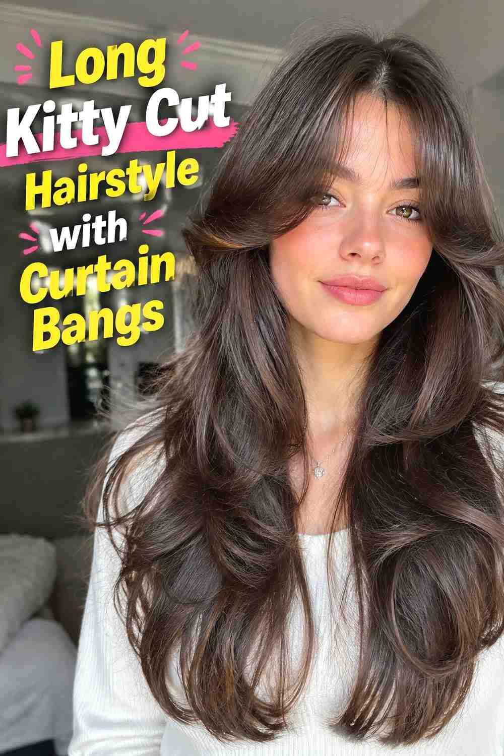 2. Long Kitty Cut Hairstyle With Curtain Bangs