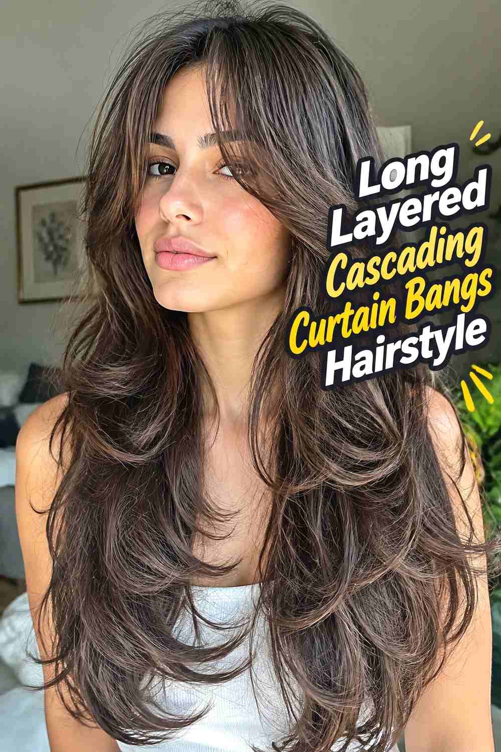 1. Long Layered Cascading Curtain Bangs Hairstyle